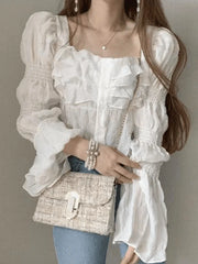 Ruffle Buttoned Cropped Long Sleeve Blouse